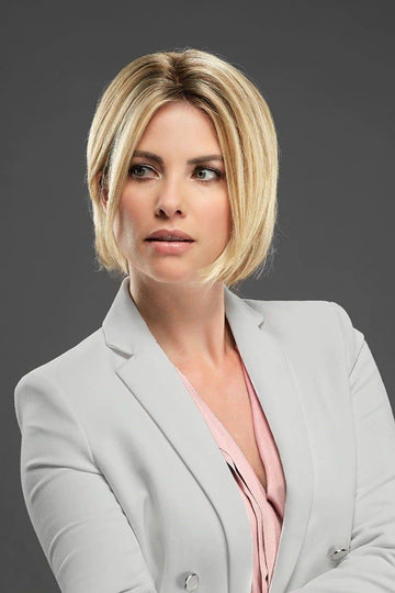 Business woman with hair loss is wearing her Euro Easipart French XL human hair topper in a blonde